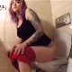 An attractive girl with arm tattoos farts loudly and repeatedly while sitting on a toilet. What sounds like a possible small plop can be heard at 1:07 into the clip. No wiping is shown. Exactly 2 minutes.